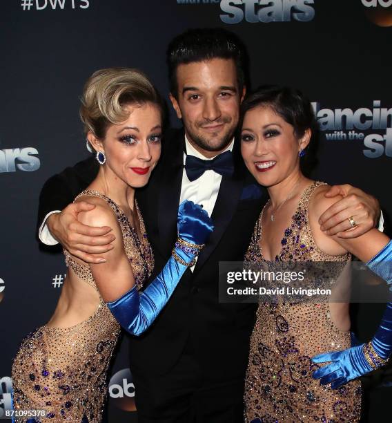 Violinist Lindsey Stirling and Olympic champion Kristi Yamaguchi pose with dancer Mark Ballas at "Dancing with the Stars" season 25 at CBS Televison...