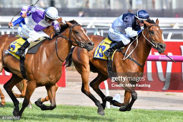 Pedrena ridden by Michael Dee wins The Hong Kong Jockey Club Stakes at Flemington Racecourse on November 07, 2017 in Flemington, Australia.