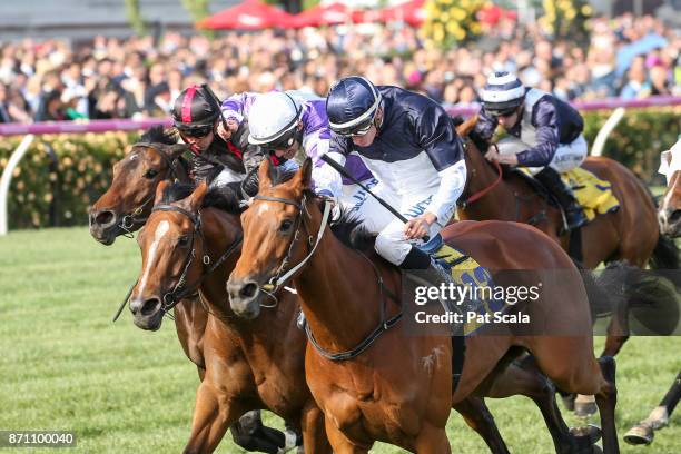 Pedrena ridden by Michael Dee wins the The Hong Kong Jockey Club Stakes at Flemington Racecourse on November 07, 2017 in Flemington, Australia.