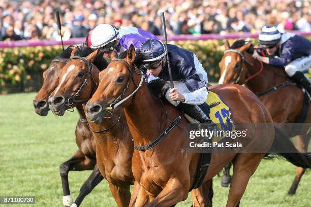 Pedrena ridden by Michael Dee wins The Hong Kong Jockey Club Stakes at Flemington Racecourse on November 07, 2017 in Flemington, Australia.