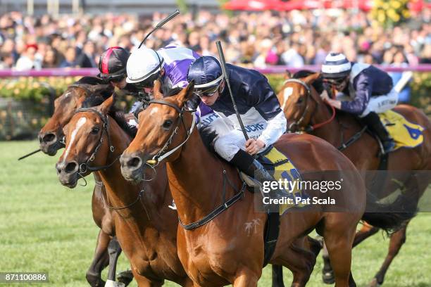 Pedrena ridden by Michael Dee wins The Hong Kong Jockey Club Stakes at Flemington Racecourse on November 07, 2017 in Flemington, Australia.