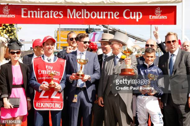 Trainer Joseph O'Brien, owner Lloyd Williams, jockey Corey Brown and Nick Williams celebrate after winning the Melbourne Cup with their horse...