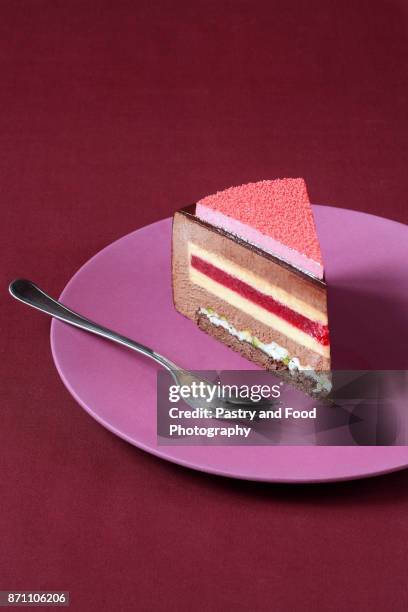 slice of chocolate raspberry mousse cake - mousse cake stock pictures, royalty-free photos & images