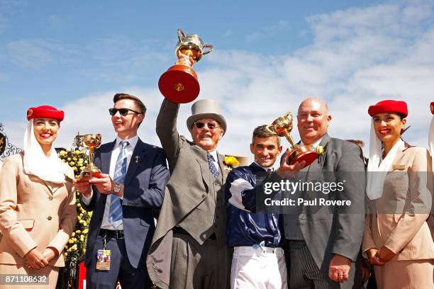 Trainer Joseph O'Brien, owner Lloyd Williams, jockey Corey Brown and Emirates Divisional Vice President Barry Brown celebrate after winning race 7,...