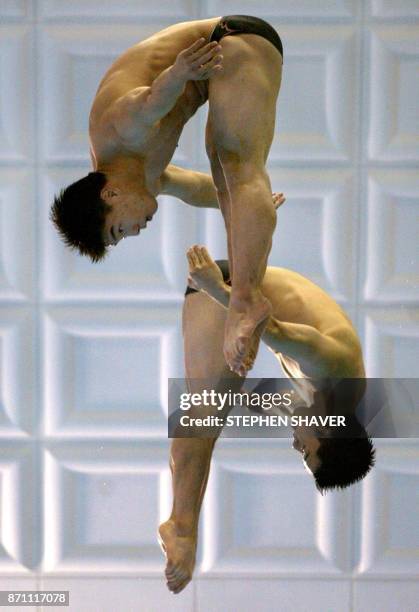 South Korea's Cho Kwan-Hoon and Kwon Kyung-Min perform in the men's 10m Synchronized Diving event 08 October 2002 at the 14th Asian Games in Busan....