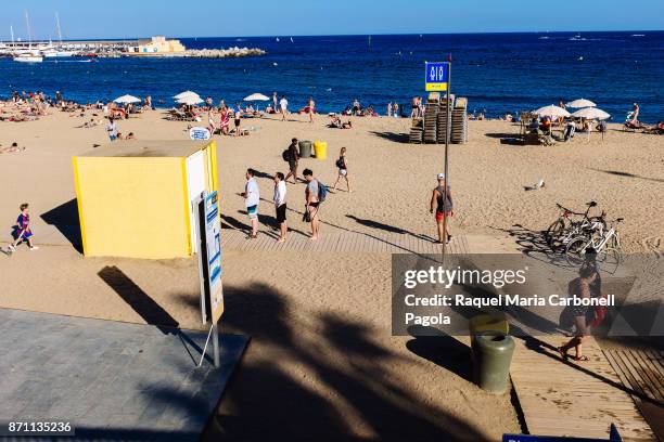 Tourists on the Barceloneta beach in summer.