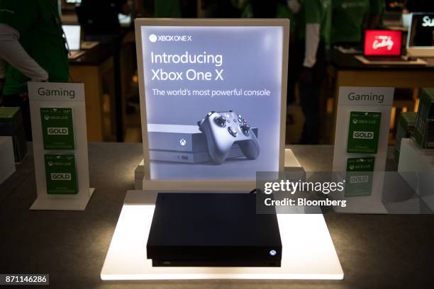 An Xbox One X game console sits on display during the Microsoft Corp. Global launch event in New York, U.S., on Monday, Nov. 6, 2017. As Microsoft...