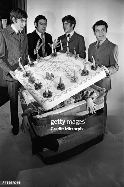 Eric Idle, Terry Jones, Michael Palin and David Jason help Denise Coffey celebrate her birthday on the set of 'Do Not Adjust Your Set', 12th December...