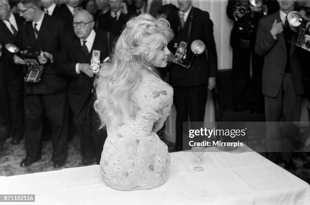 French film actress Brigitte Bardot in England to make a new film 'Babette Goes to War'. April 1959.