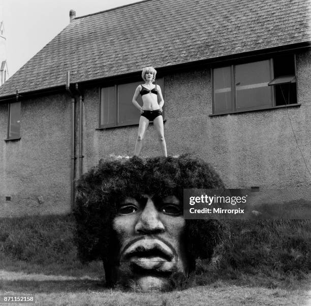 Jimi Hendrix model head. Picture shows Caroline Brown opening a new Jonathan King produced BBC 1 television programme called 'Whatever Next' . The...