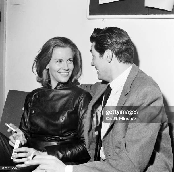 Honor Blackman and husband Maurice Kaufmann at Television House, Kingsway, where she has appeared on the news, 9th January 1964.