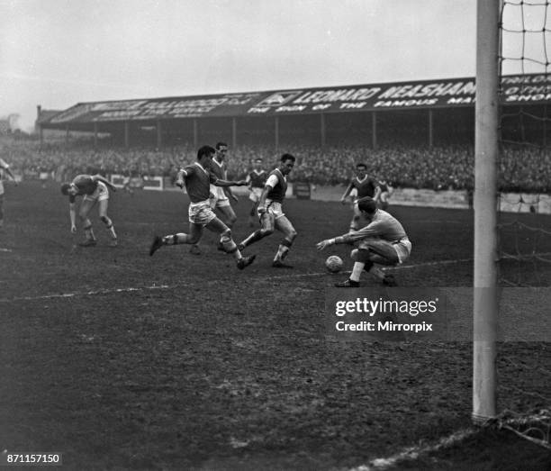 Cup match, Walsall F.C, 2 - 3 Peterborough United F.C. Held at Fellows Park. Daley, Peterborough goalie in a tussle with Tony Richards of Walsall...