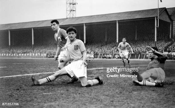 Cup Semi Final match at Hillsborough. Nottingham Forest 1 v Aston Villa 0. Forest centre-forward Tommy Wilson is thwarted by a combination of Aston...