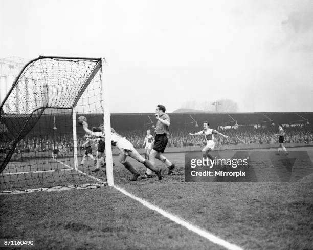 Bristol Rovers v Swansea Town, Division 2. Bristol Rovers forward Ward dives in after the ball, but centre forward Meyer had already made sure of...