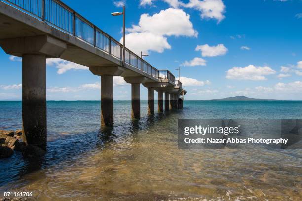 rangitoto island view from murrays bay, auckland, new zealand. - rangitoto stock pictures, royalty-free photos & images