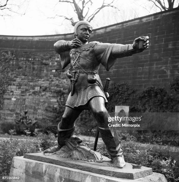 Robin Hood statue, Castle Place, Nottingham, Nottinghamshire. The Robin Hood statue is pictured with the bow and arrow missing. In the 1950s and...
