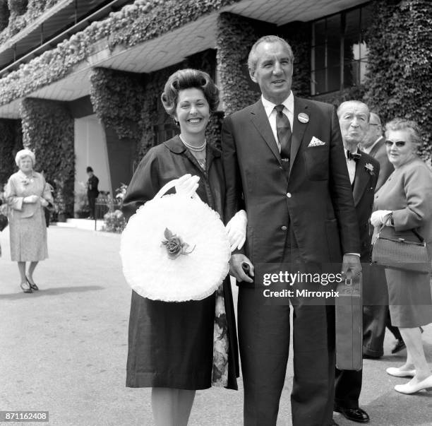 Fred Perry with his wife Barbara Riese at Wimbledon Tennis Championships, 27th June 1962.