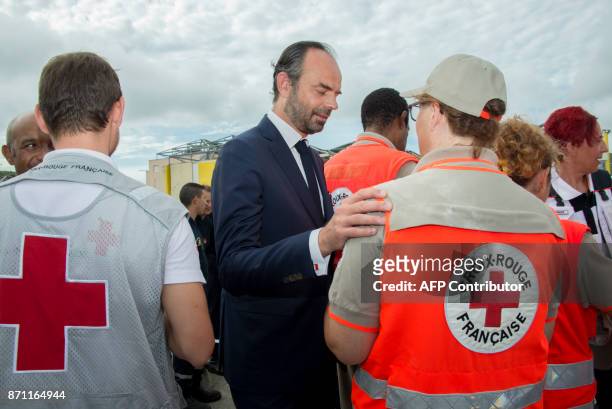 French Prime minister Edouard Philippe meets Croix Rouge staff during a visit in Marigot, on the French overseas island of Saint-Martin on November 6...