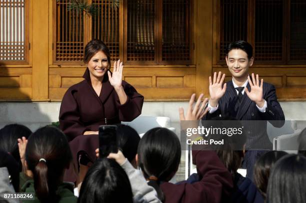 First lady Melania Trump and Choi Min-ho, a member of South Korean boy band Shinee wave during the "Girls Play 2!" Initiative, an Olympic public...