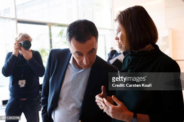 Chairman Cem Ozdemir and Chairwoman Katrin Goering-Eckardt of The Greens party, talk during the second phase of coalition negotiations at the...