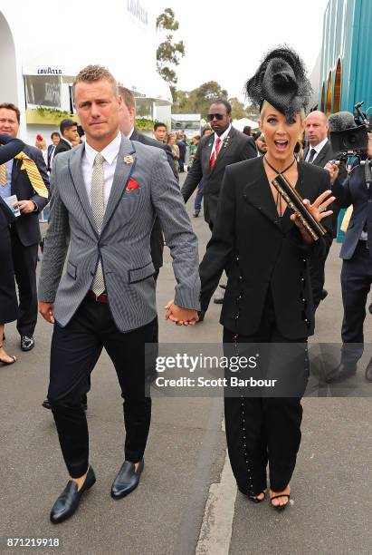 Lleyton Hewitt and Bec Hewitt arrive at the Kennedy Marquee on Melbourne Cup Day at Flemington Racecourse on November 7, 2017 in Melbourne, Australia.