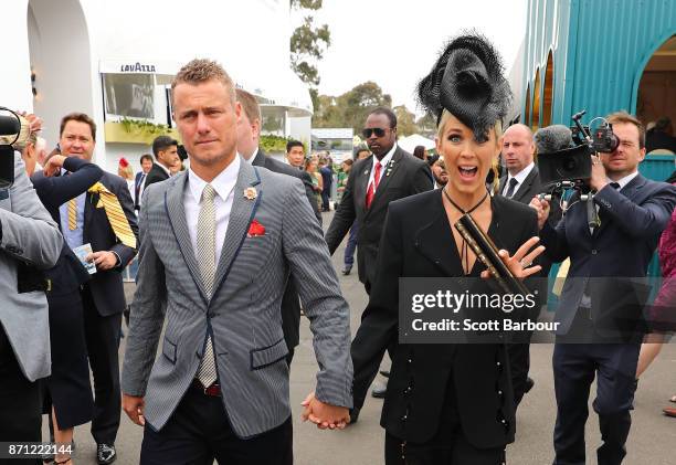 Lleyton Hewitt and Bec Hewitt arrive at the Kennedy Marquee on Melbourne Cup Day at Flemington Racecourse on November 7, 2017 in Melbourne, Australia.