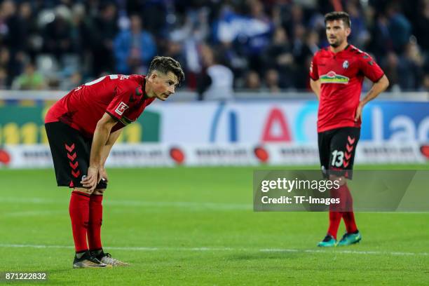 Robin Koch of Freiburg and Marco Terrazzino of Freiburg "nlooks dejected during the Bundesliga match between Sport-Club Freiburg and FC Schalke 04 at...