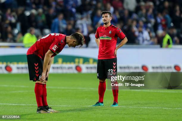 Robin Koch of Freiburg and Marco Terrazzino of Freiburg "nlooks dejected during the Bundesliga match between Sport-Club Freiburg and FC Schalke 04 at...