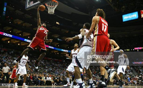 LeBron James of the Cleveland Cavaliers goes up for a dunk against the Atlanta Hawks during Game Four of the Eastern Conference Semifinals during the...