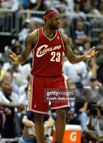 LeBron James of the Cleveland Cavaliers reacts to a call in action against the Atlanta Hawks during Game Four of the Eastern Conference Semifinals...