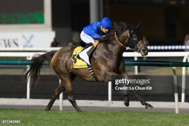 Silvestre De Sousa riding Sajjhaa wins Dubai Duty Free during the Dubai World Cup race day at the Meydan Racecourse on March 30, 2013 in Dubai,...