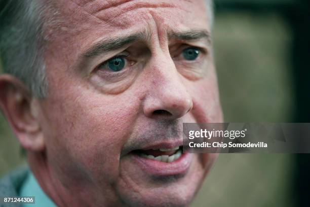 Republican candidate for Virginia governor Ed Gillespie talks to journalists after casting his vote at the polling place at Washington Mill...