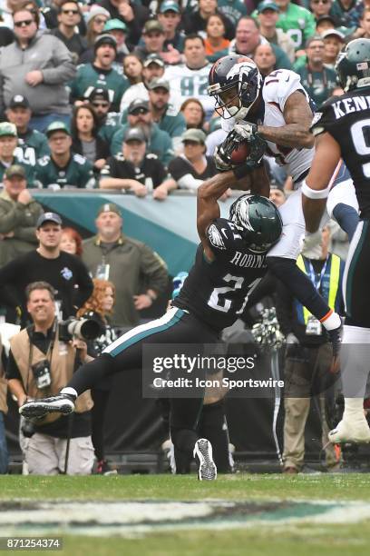 Denver Broncos wide receiver Cody Latimer catches a pass over Philadelphia Eagles cornerback Patrick Robinson during a NFL football game between the...