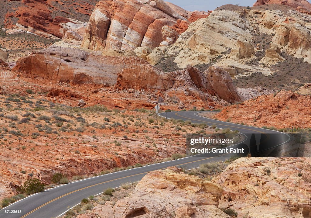 Winding road through rock formations