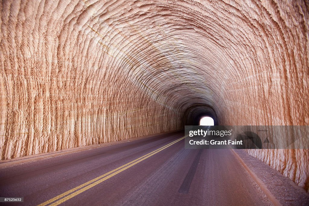 Interior view of car tunnel through sandstone