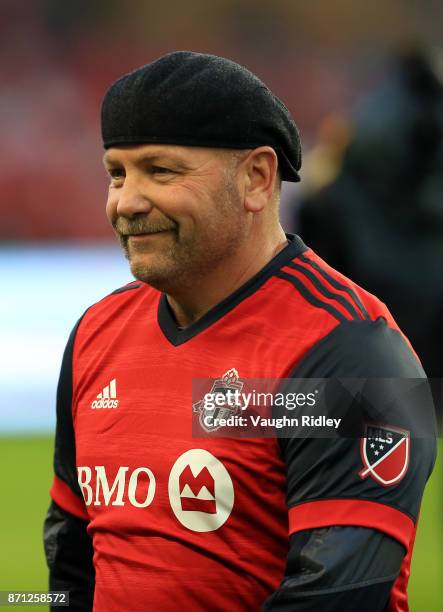 Former Toronto Maple Leaf Wendal Clark presents the match ball prior to the first half of the MLS Eastern Conference Semifinal, Leg 2 game between...