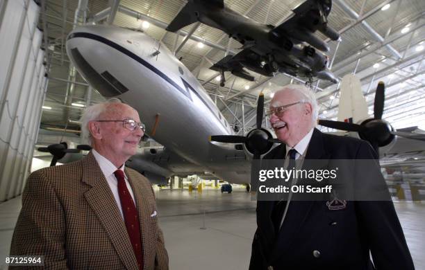 Geoff Boston and Zeke Hacke two former pilots who flew in the Berlin Airlift chat in front of a Hastings C1A aircraft which was used to transport...