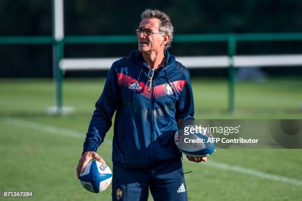 French national rugby union team head coach Guy Noves supervises a training session in Marcoussis, near Paris, on November 7, 2017 ahead of the...