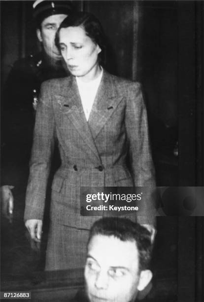 Yvonne Chevallier appears in the dock at the Reims Court of Assizes, charged with the murder of her husband Pierre Chevallier, Mayor of Orleans and a...