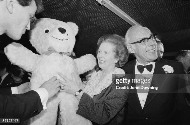 British Prime Minister Margaret Thatcher and her husband Denis attend a ball during the Conservative Party Conference in Brighton, 11th October 1984....
