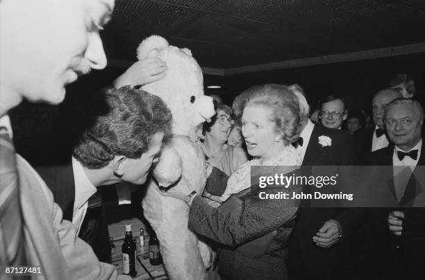 British Prime Minister Margaret Thatcher attends a ball during the Conservative Party Conference in Brighton, 11th October 1984. That night, the...