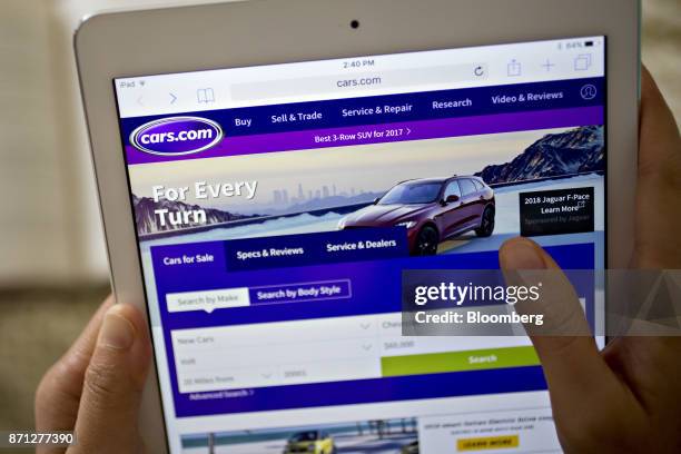 The Cars.com Inc. Website is displayed for a photograph on an Apple Inc. IPad in Washington, D.C., U.S., on Saturday, Nov. 4, 2017. Cars.com Inc. Is...