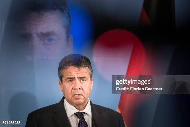 German Foreign Minister and Vice Chancellor Sigmar Gabriel is pictured through a camera viewfinder during a press statement after his meeting with...
