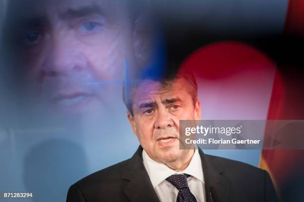 German Foreign Minister and Vice Chancellor Sigmar Gabriel is pictured through a camera viewfinder during a press statement after his meeting with...
