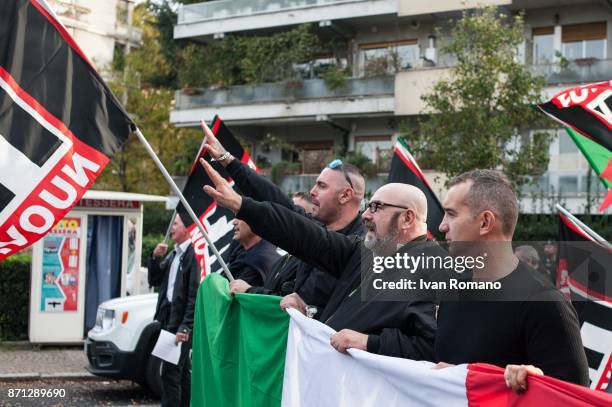 Militants do the fascist greeting in the "Eur" neighborhood built during the Twenty Years of Benito Mussolini's fascism in Rome, for "Everything for...