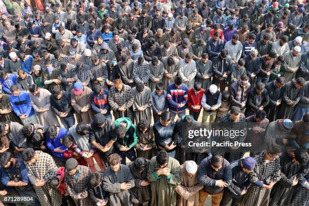 People offering funeral prayers of a local militant, Waseem Ahmad on Tuesday, November 07, 2017 who was killed in an encounter that raged between the...