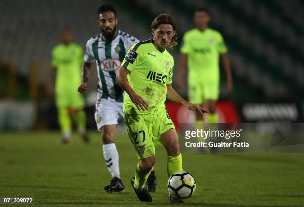Aves midfielder Ryan Gauld from Scotland with Vitoria Setubal midfielder Joao Costinha from Portugal in action during the Primeira Liga match between...