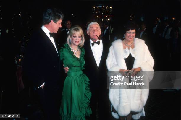 Aaron Spelling and his wife Candy, with Nolan Miller attend a Beverly Hills party August 12 Beverly Hills, California "n