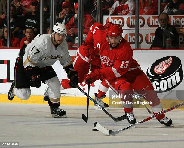 Pavel Datsyuk of the Detroit Red Wings skates past Petteri Nokelainen of the Anaheim Ducks during Game Five of the Western Conference Semifinal Round...