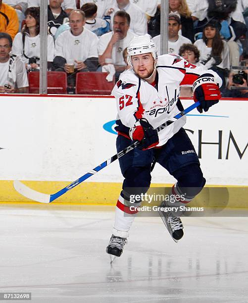 Mike Green of the Washington Capitals makes a pass against the Pittsburgh Penguins during Game Six of the Eastern Conference Semifinals of the 2009...